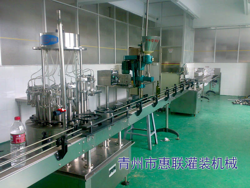 負(fù)壓灌裝機(jī) 負(fù)壓灌裝機(jī)